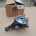 2007-2011 Dodge Caliber New Genuine Mopar Left Steering Knuckle & Hub Assy. Fixed Price $195.00.